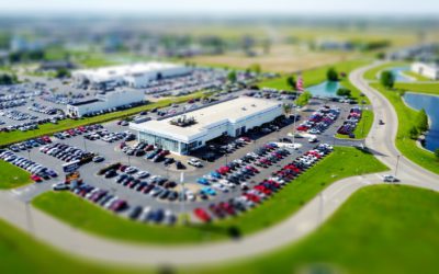 Aerial view of car dealership.